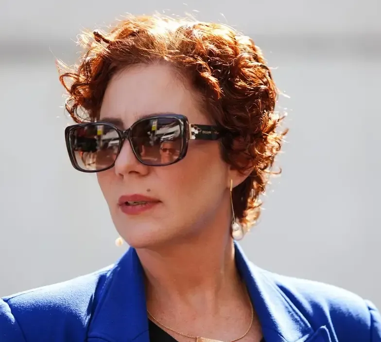 Carla, 35 anos, advogada
